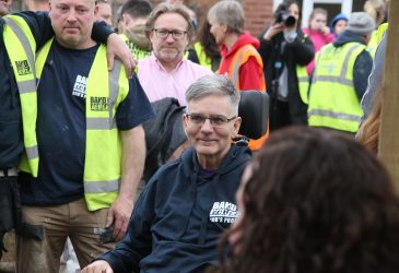 Paralysed man returns home